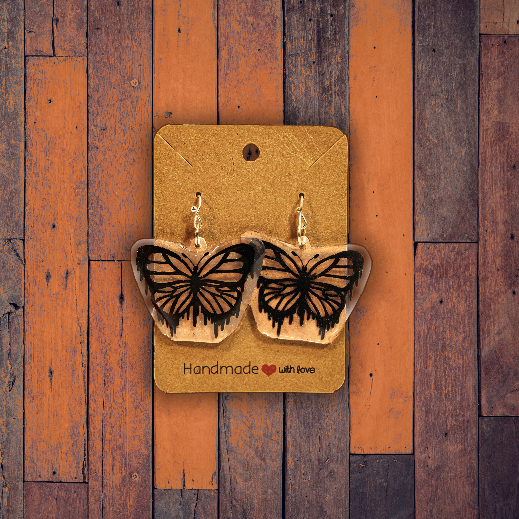Pendientes de mariposa chorreantes
